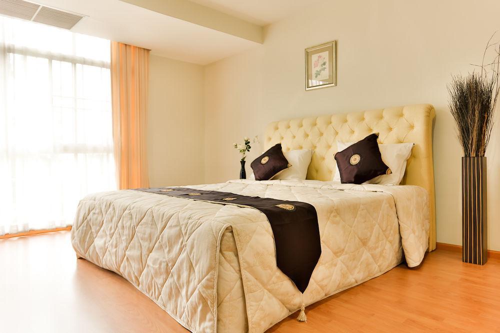 The Capital Resort @ Sukhumvit 50 Bangkok Exteriér fotografie A bedroom at the hotel